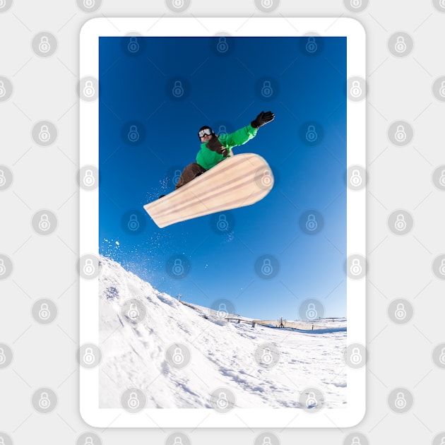 Snowboarder jumping against blue sky Sticker by homydesign